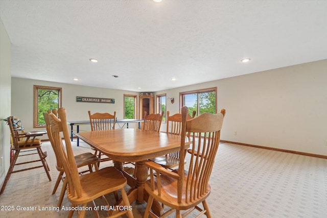 10949 Lakeside Dr, Perrinton, MI 48871 - dining room with light carpet, baseboards, and recessed lighting