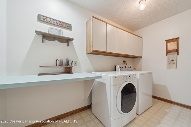 10949 Lakeside Dr, Perrinton, MI 48871 - washroom with light floors, washer and clothes dryer, cabinet space, a textured ceiling, and baseboards