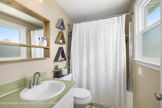 3229 Inverary Dr, Lansing, MI 48911 - full bathroom featuring vanity, shower / tub combo with curtain, and toilet