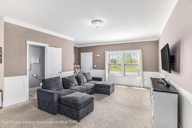 15145 Nottingham Fields Pkwy, Lansing, MI 48906 - carpeted living area featuring a wainscoted wall