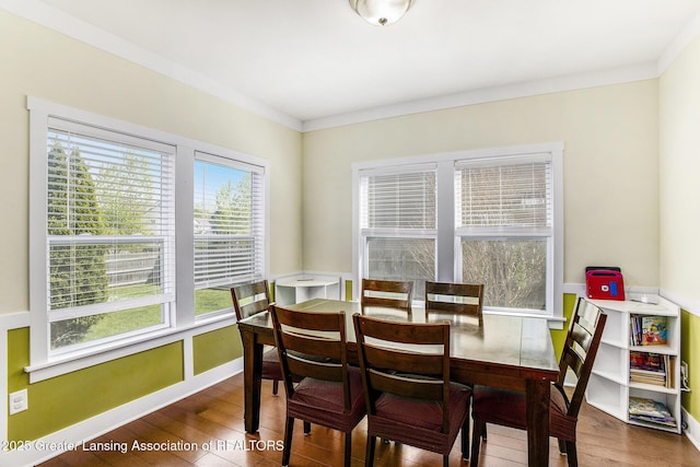 15145 Nottingham Fields Pkwy, Lansing, MI 48906 - dining space featuring wood finished floors and baseboards