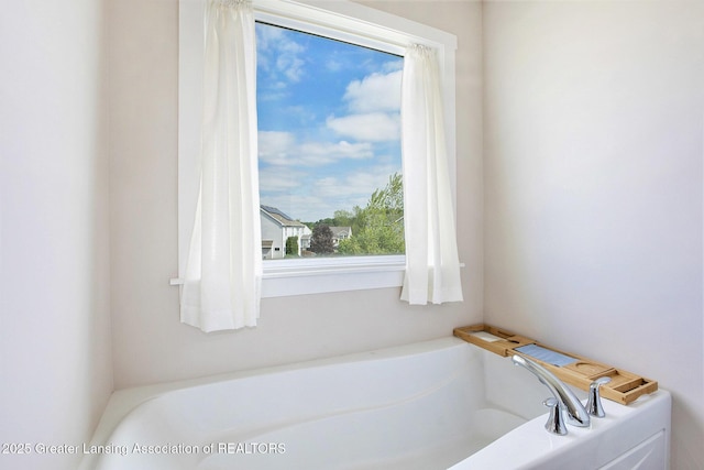 15145 Nottingham Fields Pkwy, Lansing, MI 48906 - bathroom featuring a bath