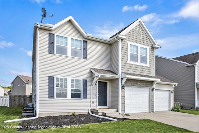 15145 Nottingham Fields Pkwy, Lansing, MI 48906 - view of front of house with an attached garage and driveway