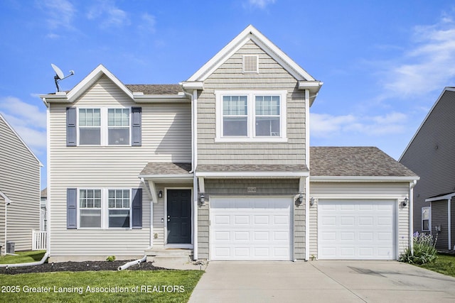 15145 Nottingham Fields Pkwy, Lansing, MI 48906 - view of front of property with driveway and a shingled roof