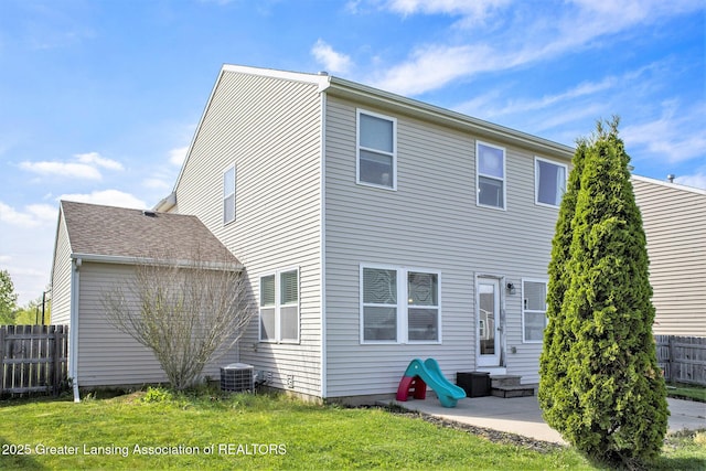 15145 Nottingham Fields Pkwy, Lansing, MI 48906 - rear view of house featuring central AC, a patio area, and entry steps