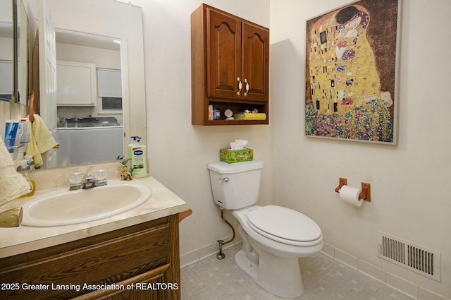 37936 Watkins Dr Unit 32, Sterling Heights, MI 48312 - half bathroom featuring vanity, baseboards, toilet, and tile patterned flooring