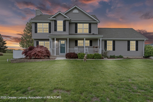 1600 Tuttle Rd, Mason, MI 48854 - traditional-style house featuring a chimney, covered porch, a lawn, and roof with shingles