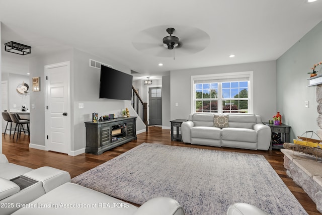 1600 Tuttle Rd, Mason, MI 48854 - living area with stairs, ceiling fan, dark wood finished floors, recessed lighting, and baseboards