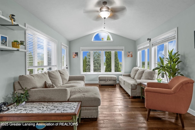 1600 Tuttle Rd, Mason, MI 48854 - living area featuring ceiling fan, vaulted ceiling, dark wood-style flooring, and plenty of natural light