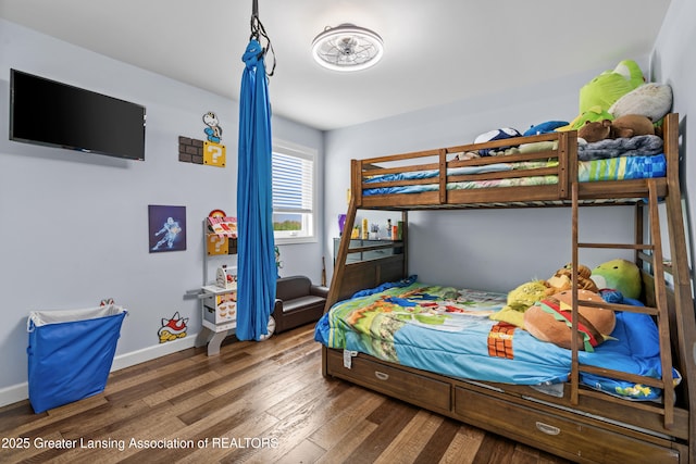 1600 Tuttle Rd, Mason, MI 48854 - bedroom with wood finished floors and baseboards