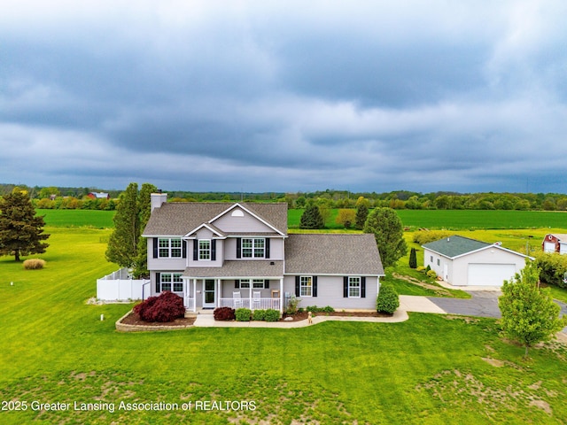 1600 Tuttle Rd, Mason, MI 48854 - traditional-style home featuring covered porch, a garage, an outbuilding, a chimney, and a shingled roof