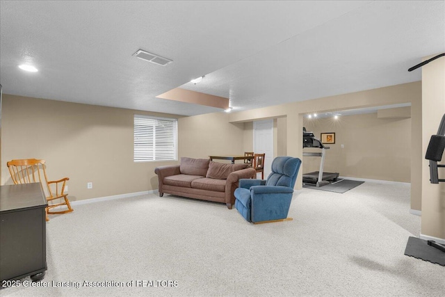 703 Hastay Blvd, Eaton Rapids, MI 48827 - carpeted living room featuring baseboards