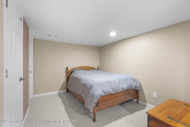703 Hastay Blvd, Eaton Rapids, MI 48827 - bedroom with baseboards, recessed lighting, and carpet flooring
