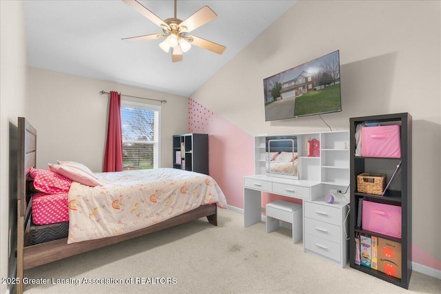 703 Hastay Blvd, Eaton Rapids, MI 48827 - carpeted bedroom with lofted ceiling, baseboards, and ceiling fan