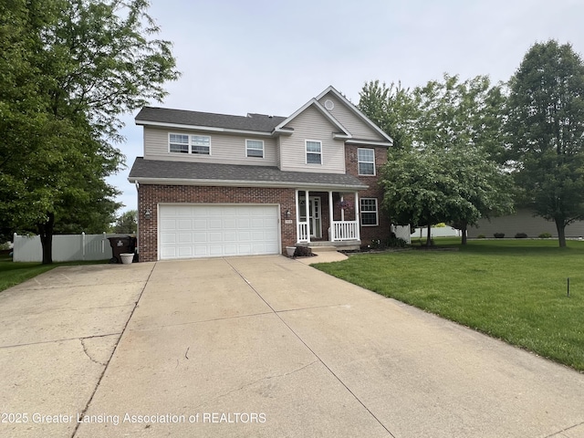 703 Hastay Blvd, Eaton Rapids, MI 48827 - traditional-style home featuring brick siding, concrete driveway, an attached garage, and a shingled roof