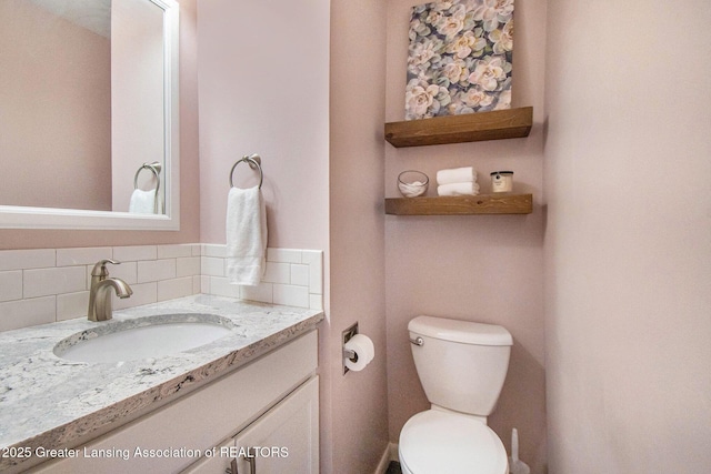 4626 Blackberry Ln, Lansing, MI 48917 - bathroom featuring vanity and toilet
