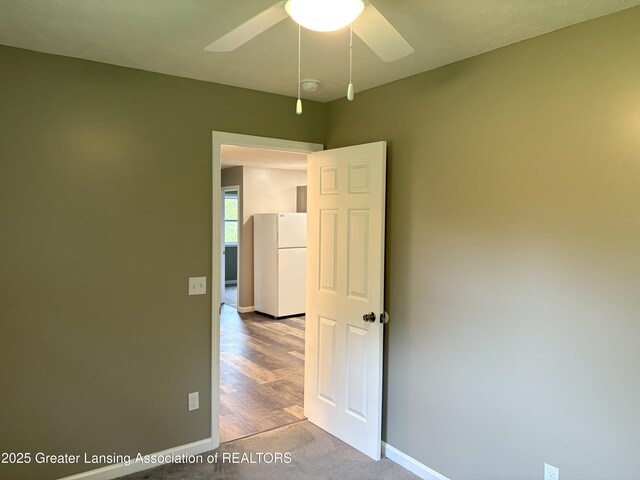 4684 Sherman Rd, Charlotte, MI 48813 - empty room with baseboards, a ceiling fan, carpet flooring, and a smoke detector