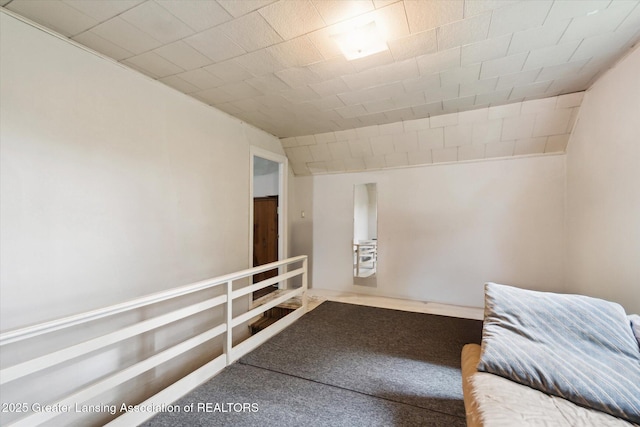 6275 E Clark Rd, Bath, MI 48808 - unfurnished room featuring carpet flooring and vaulted ceiling