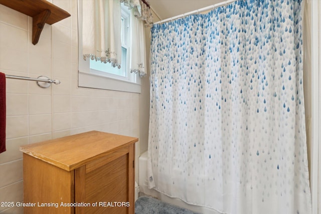 6275 E Clark Rd, Bath, MI 48808 - full bathroom featuring tile walls and shower / bathtub combination with curtain