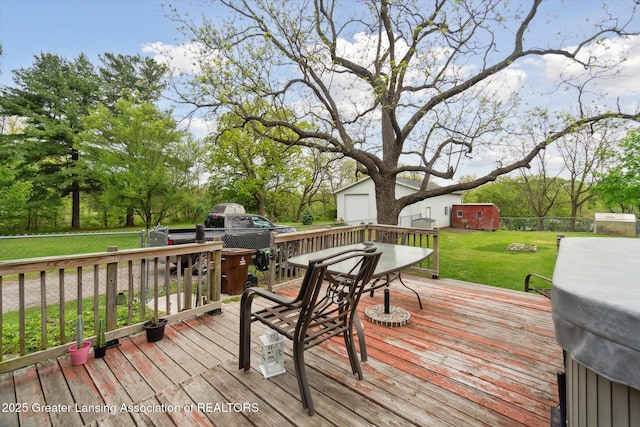 6275 E Clark Rd, Bath, MI 48808 - wooden deck with an outdoor structure, outdoor dining space, and a garage