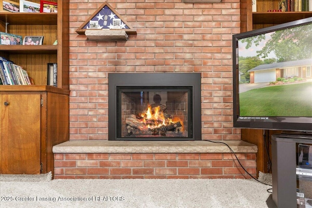 14921 Karl Dr, Lansing, MI 48906 - detailed view of a fireplace and carpet floors