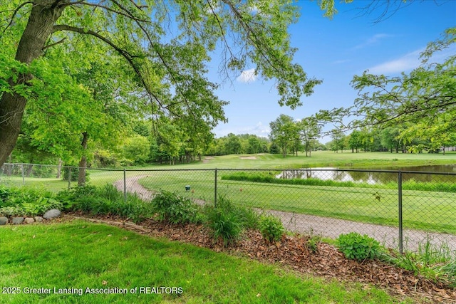 14921 Karl Dr, Lansing, MI 48906 - view of yard featuring a water view