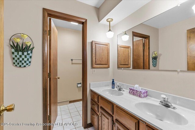 14921 Karl Dr, Lansing, MI 48906 - full bathroom featuring double vanity and tile patterned floors