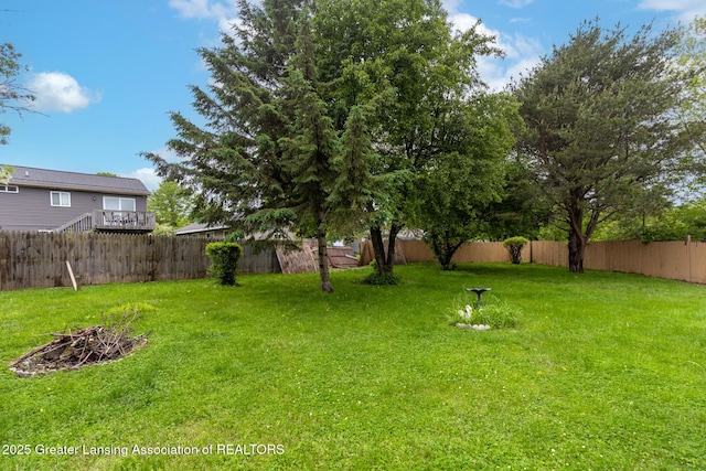 4316 Dumfries Cir, Lansing, MI 48911 - view of yard featuring an outdoor fire pit