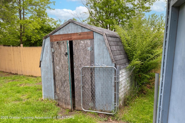 4316 Dumfries Cir, Lansing, MI 48911 - view of shed with a gate