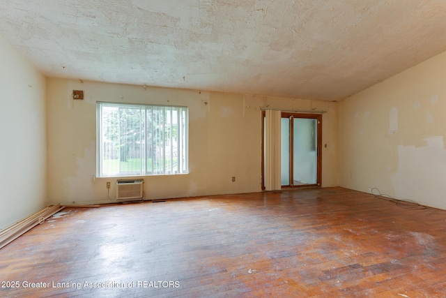 4316 Dumfries Cir, Lansing, MI 48911 - spare room featuring hardwood / wood-style floors and a wall unit AC