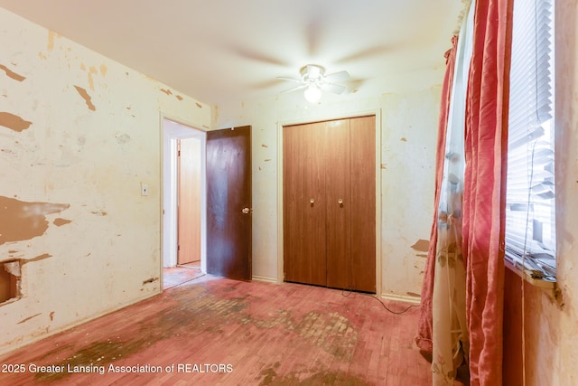 4316 Dumfries Cir, Lansing, MI 48911 - unfurnished bedroom with wood finished floors and a closet