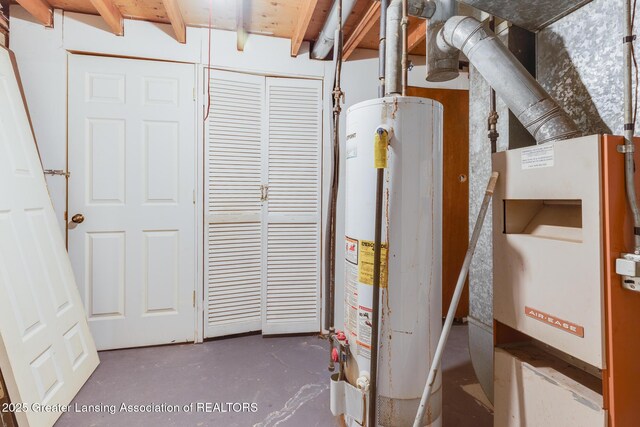 4316 Dumfries Cir, Lansing, MI 48911 - utility room featuring water heater