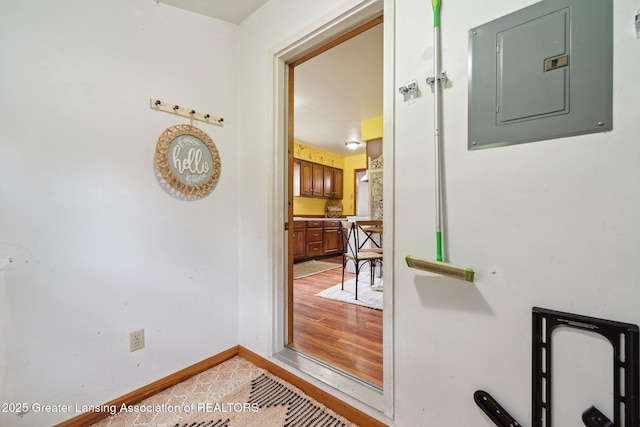 445 S Oak St, Maple Rapids, MI 48853 - doorway featuring electric panel and baseboards