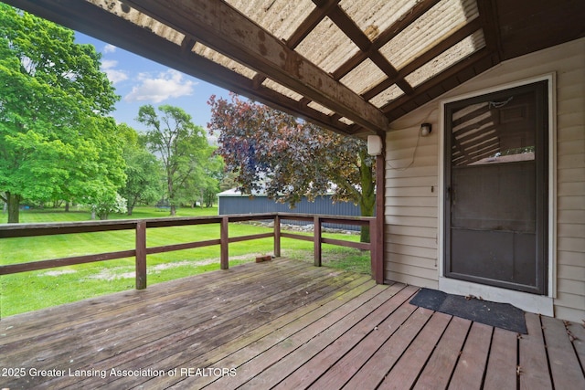 445 S Oak St, Maple Rapids, MI 48853 - deck featuring a lawn