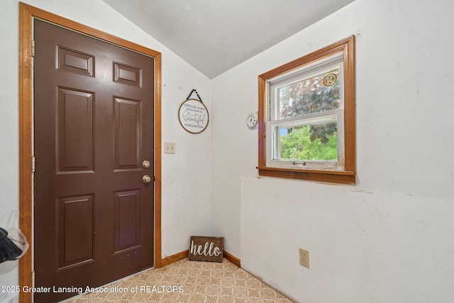 445 S Oak St, Maple Rapids, MI 48853 - entrance foyer with vaulted ceiling and baseboards