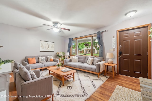 445 S Oak St, Maple Rapids, MI 48853 - living room with ceiling fan and light wood-style floors