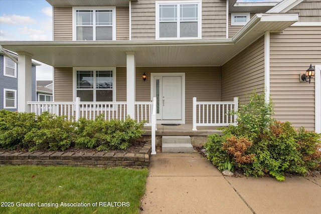 619 Willet Way E, Lansing, MI 48823 - entrance to property featuring covered porch