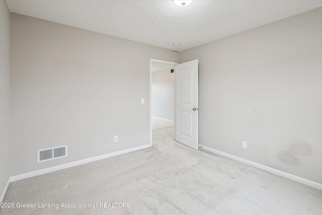 619 Willet Way E, Lansing, MI 48823 - carpeted empty room with baseboards and a smoke detector