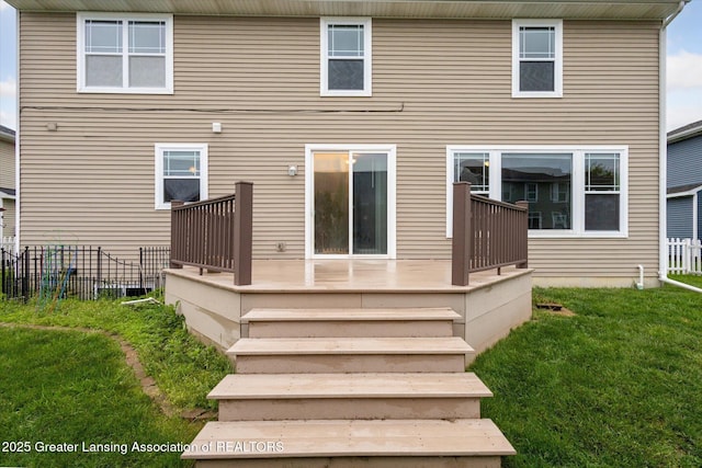 619 Willet Way E, Lansing, MI 48823 - rear view of house with a wooden deck