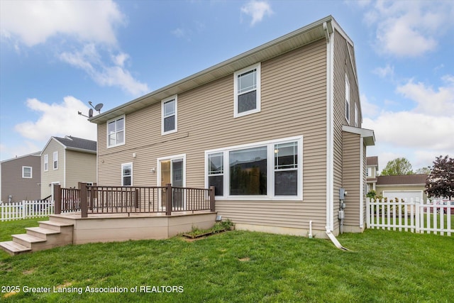 619 Willet Way E, Lansing, MI 48823 - back of property with a deck