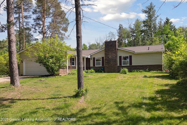 7050 E Eaton Hwy, Sunfield, MI 48890 - view of front facade with a chimney, brick siding, a garage, and a front lawn
