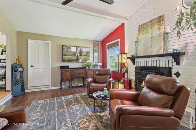 7050 E Eaton Hwy, Sunfield, MI 48890 - living room with wood finished floors, baseboards, and a brick fireplace