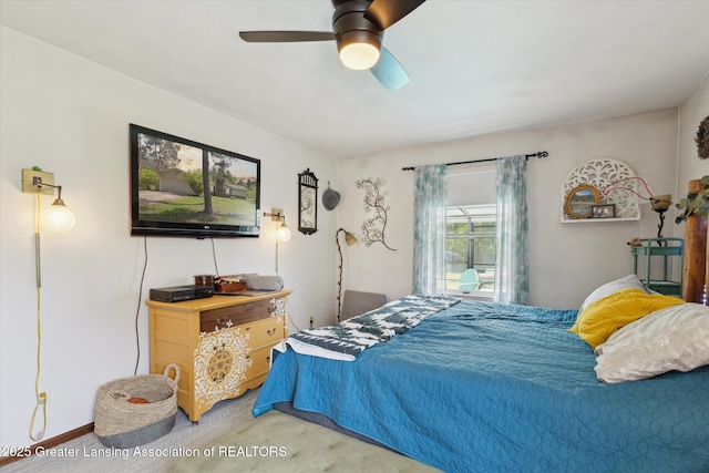 7050 E Eaton Hwy, Sunfield, MI 48890 - bedroom featuring carpet flooring, ceiling fan, and baseboards