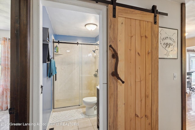 7050 E Eaton Hwy, Sunfield, MI 48890 - bathroom with a stall shower, toilet, and tile patterned floors