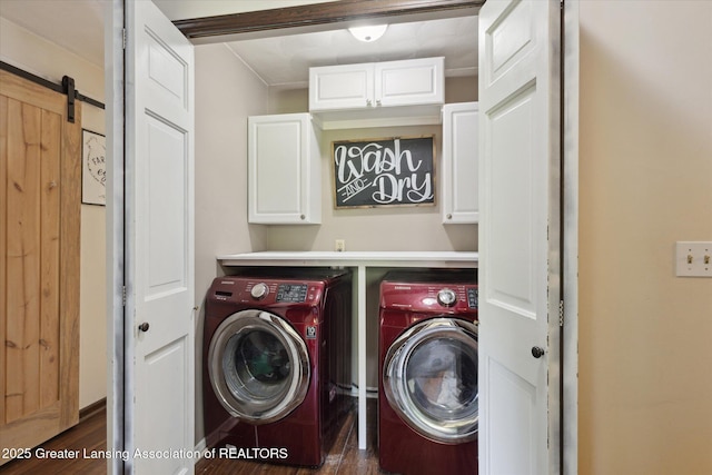 7050 E Eaton Hwy, Sunfield, MI 48890 - laundry room featuring cabinet space, washing machine and dryer, dark wood-type flooring, and a barn door