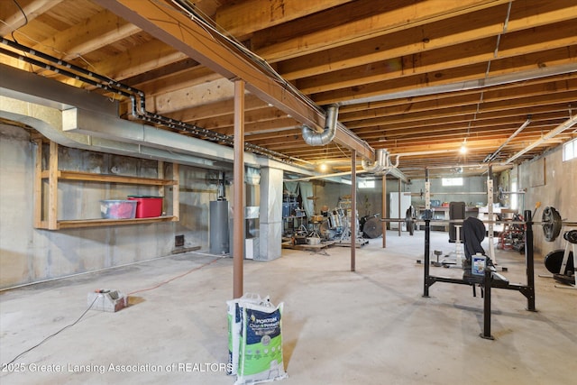 7050 E Eaton Hwy, Sunfield, MI 48890 - unfinished basement featuring water heater and heating unit