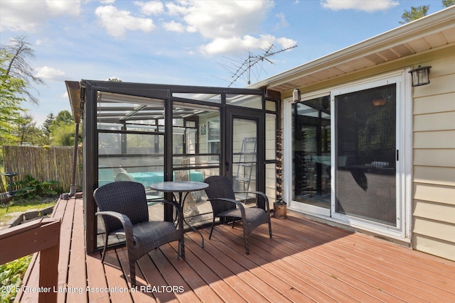 7050 E Eaton Hwy, Sunfield, MI 48890 - wooden terrace featuring glass enclosure and a swimming pool