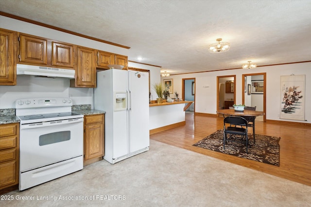 7161 E Eaton Hwy, Mulliken, MI 48861 - kitchen featuring white appliances, under cabinet range hood, a chandelier, crown molding, and brown cabinets