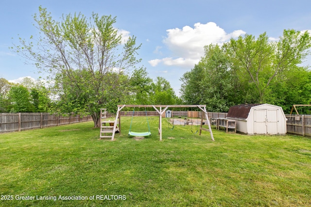 114 Walker Dr, Morrice, MI 48857 - view of yard featuring a playground