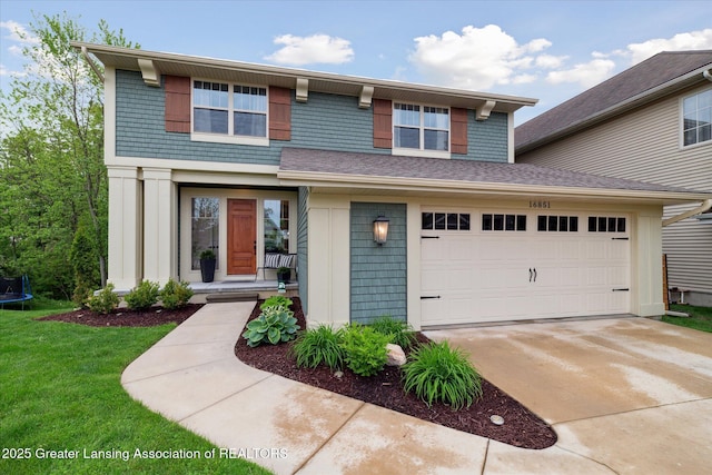 16851 Meadowbrook Dr, Haslett, MI 48840 - view of front of property featuring a trampoline, a front lawn, and concrete driveway